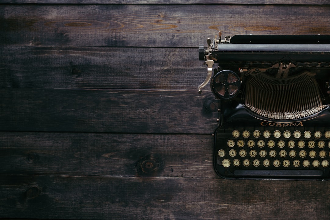 Vintage typewriter with a sheet of poetry, evoking T. S. Eliot