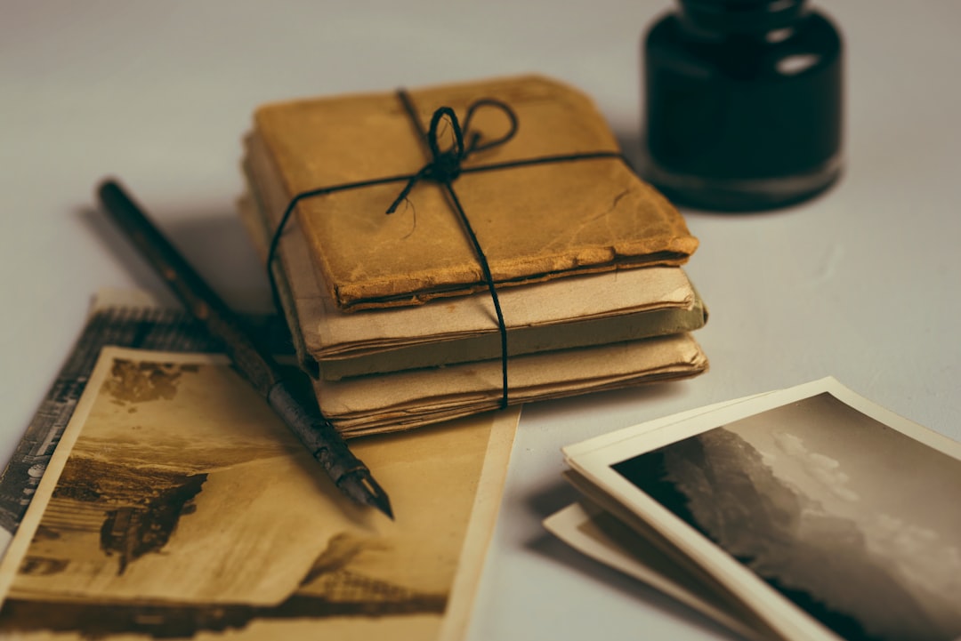Vintage poetry book and ink, evoking Rimbaud's Voyelles
