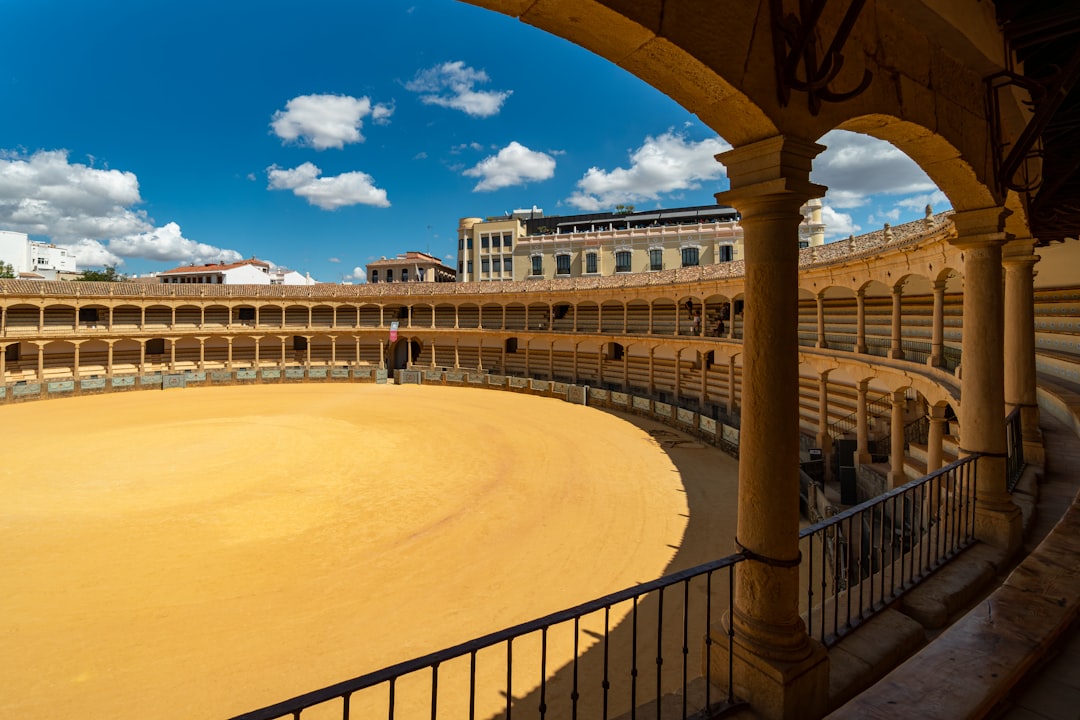 The historic Plaza de Toros de Ronda, one of Spain's oldest bullring arenas, empty and seen from the stands
