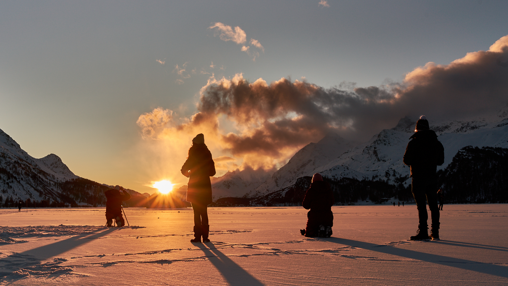 Sunset over the frozen lake at Sils Maria in the Swiss Engadin valley