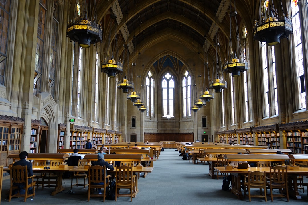 A grand, historic university library reading room